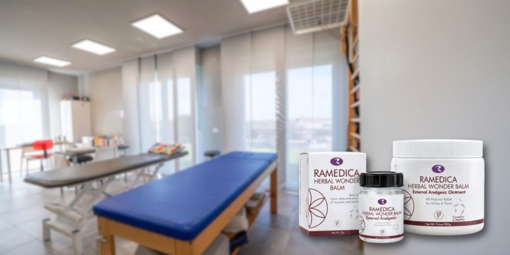 Ramedica pain relief balm range displayed in a modern physiotherapy clinic setting