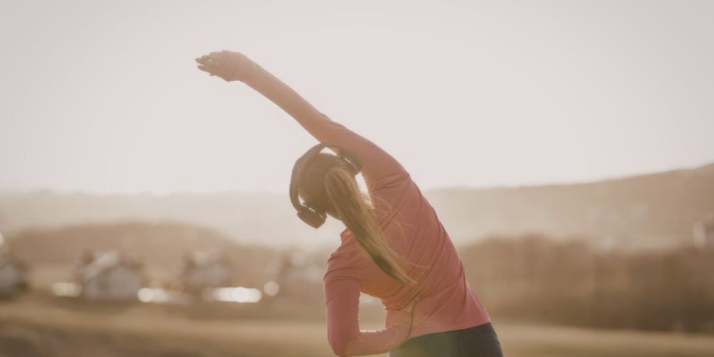 Person stretching muscles to relieve tightness and improve mobility